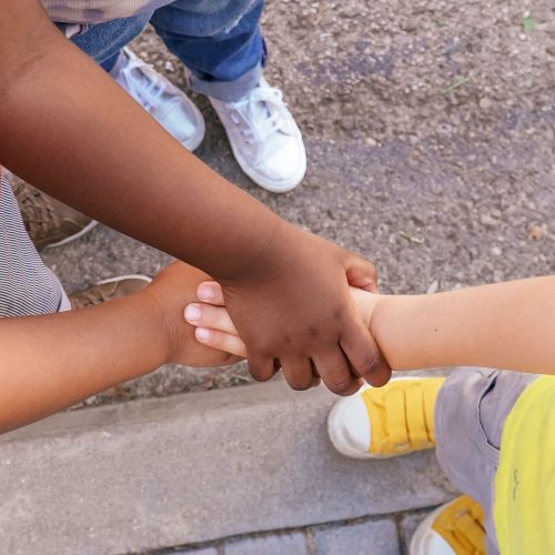 Multiethnic kids hands together. children diversity